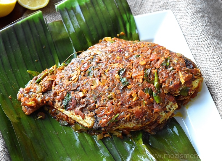 Steamed Fish in Kerala Style: Traditional Meen Pollichathu with Banana Leaves